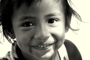 Smiling boy child face black and white